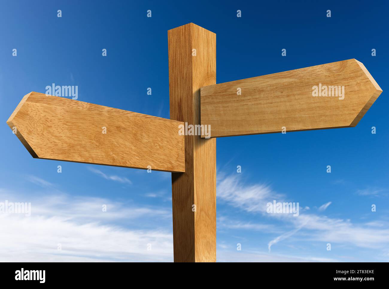 Due cartelli direzionali in legno vuoti (frecce) con palo e spazio per la copia, contro un cielo azzurro con nuvole. Foto Stock