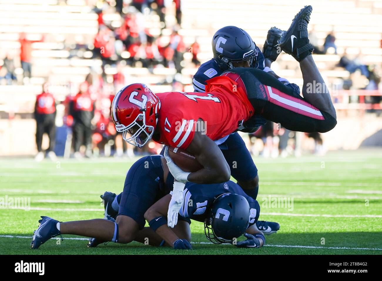 Ithaca, NY, USA. 18 novembre 2023. Il tight end Cornell Big Red Manny Adebi (17) passa in aria su un tackle del defensive back dei Columbia Lions Jayden Marshall (front) e del linebacker CJ Brown (back) durante il secondo tempo sabato 18 novembre 2023 allo Schoellkopf Field di Ithaca, New York. Columbia ha vinto 29-14. Rich Barnes/CSM/Alamy Live News Foto Stock