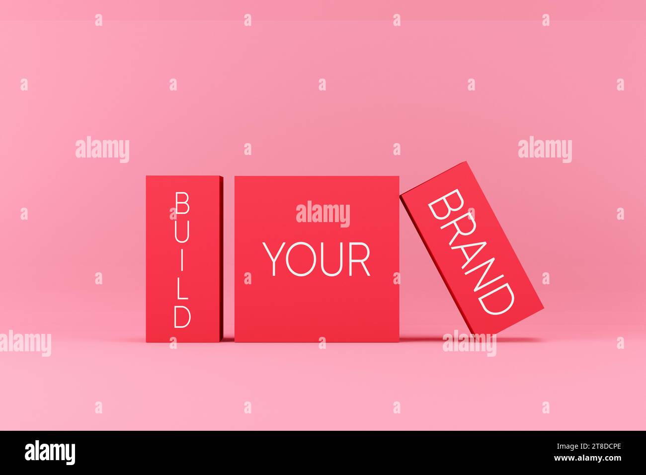 Concetto di branding e gestione del marchio. Crea il messaggio del tuo marchio su blocchi rosa. Foto Stock