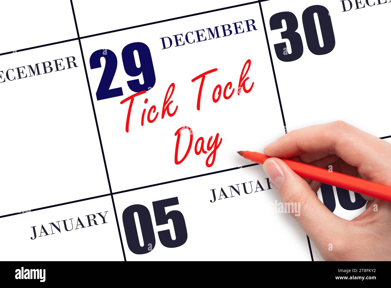 Dicembre 29. Scrivere a mano il testo Tick Tock Day nella data del calendario. Segnatevi la data. Vacanze. Concetto di giorno dell'anno. Foto Stock