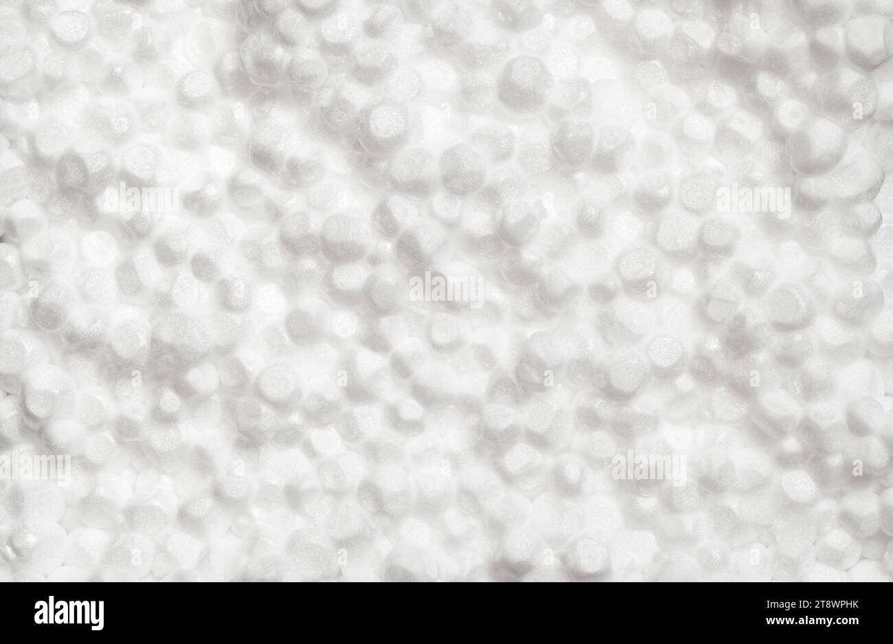 Materiale poroso espanso in polistirene espanso, mini sfere bianche, macro ravvicinato che rappresenta la schiuma, piena profondità di campo Foto Stock