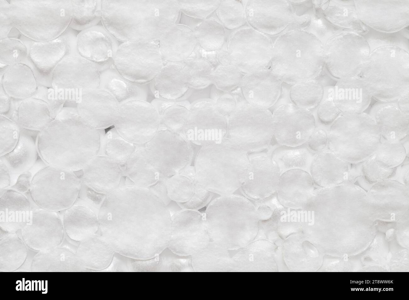 Polistirene espanso materiale poroso globuli bianchi cerchio, primo piano, che rappresenta una struttura uniforme e espansa Foto Stock