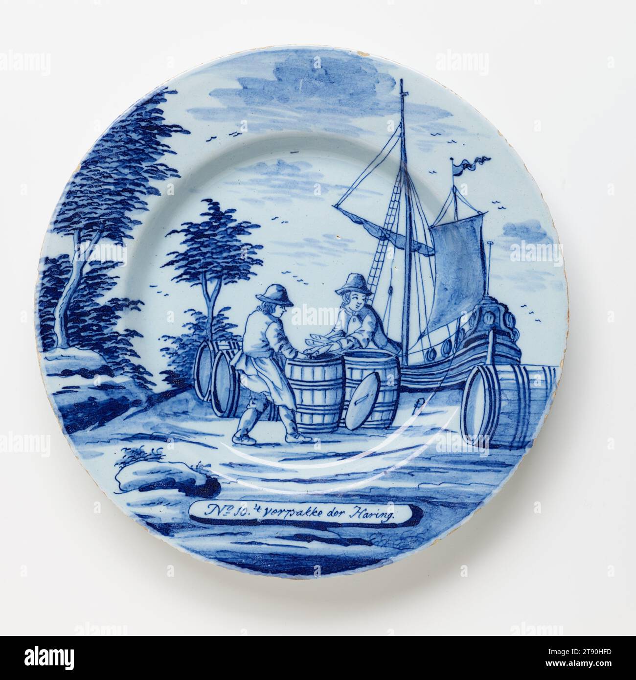 10, Verpakke der Haring (la cassa delle aringhe), da 'The Herring Catch', c. 1780, Porcelain Axe (Porceleyne Bijl) Factory, 1 x 9 x 9" (2,54 x 22,86 x 22,86 cm), terracotta smaltata in stagno, Paesi Bassi, XVIII secolo, il XVII secolo è stato chiamato l'età d'oro della Repubblica olandese, la sua prosperità costruita da una nuova e crescente classe mercantile che era diventata ricca attraverso l'industria e il commercio internazionale, la sua tolleranza alla diversità religiosa e intellettuale, e il suo patrocinio di commercianti, artigiani e artisti locali e internazionali. Foto Stock