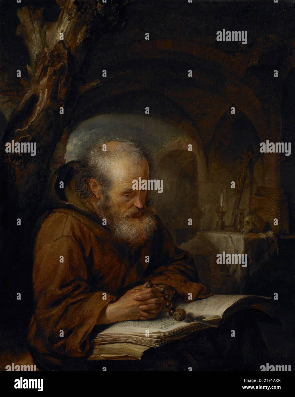 A Hermit Preying, 1670, Gerrit Dou, olandese, 1613–1675, 1/4 x 5/8 x 1/4 pollici (33,66 x 26,99 x 0,64 cm) (pannello)26 x 23 5/8 x 7/8" (66,04 x 60,01 x 7,3 cm) (incorniciato), olio su pannello, Paesi Bassi, XVII secolo, il monaco eremita si rivolge alla natura come rifugio dalle tentazioni del mondo. Nel silenzio della sua grotta, tiene un rosario e medita sul testo sacro. Il suo altare è decorato con oggetti di devozione - il crocifisso - si erge come simbolo di salvezza, la candela spenta, il cranio e la clessidra sono ricordi della brevità della vita umana Foto Stock