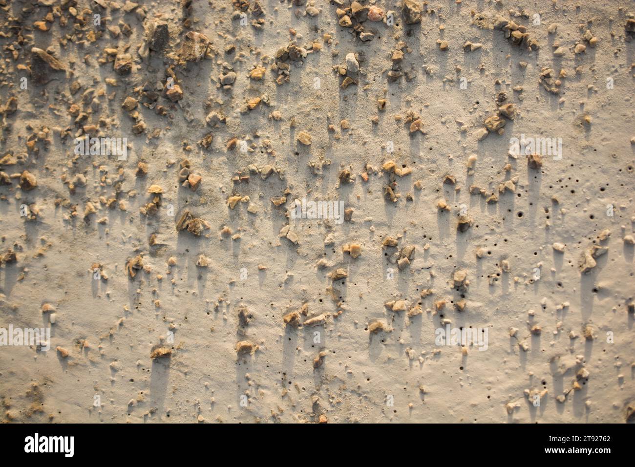 Modelli su una appena spillata superficie di cemento Foto Stock