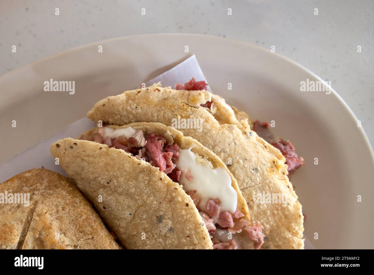 Un tacos carnitas di maiale con tortillas fatte a mano in Messico Foto Stock