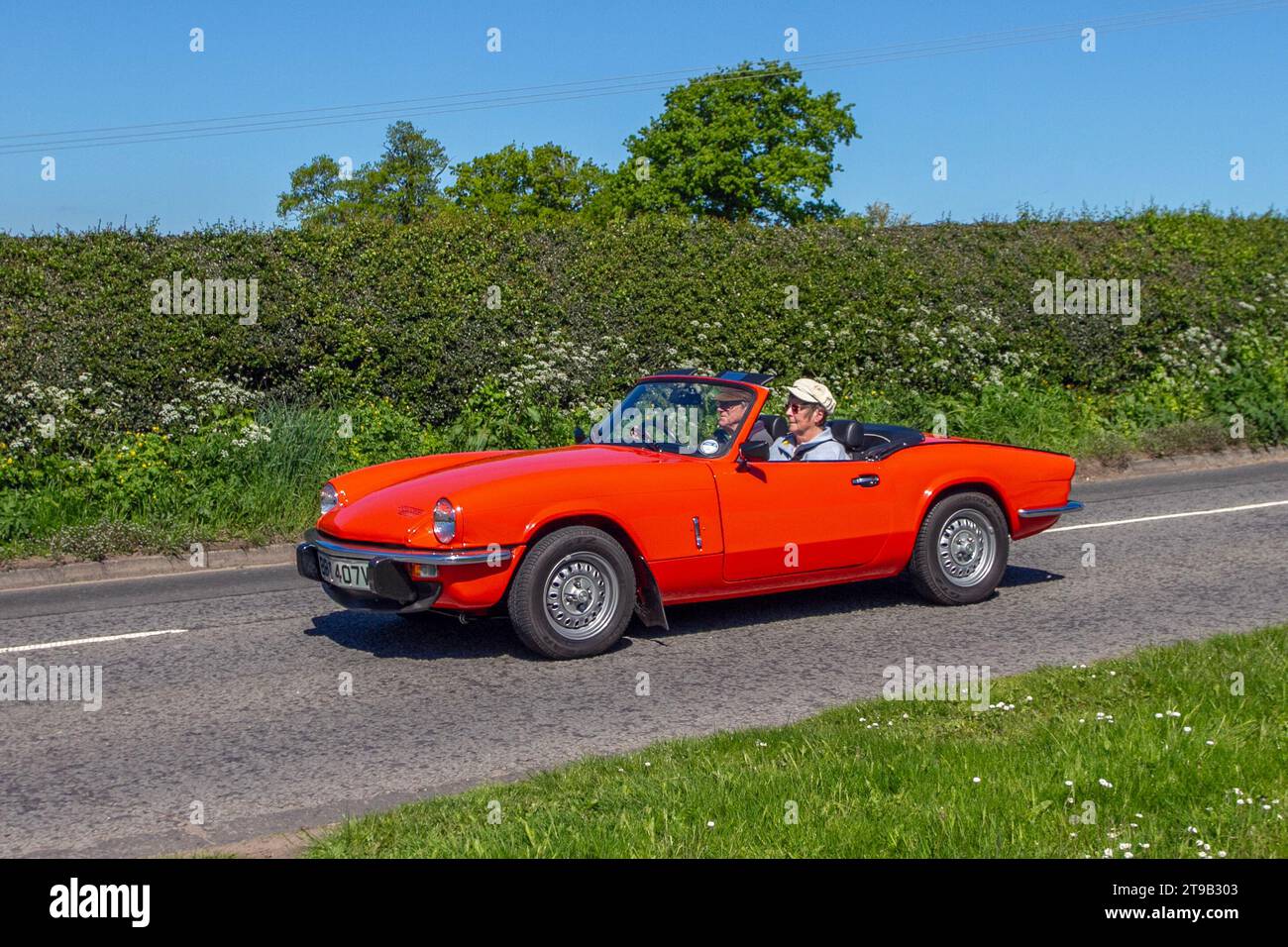 Anni '1978 70 e settanta Triumph Spitfire 1500 Red Car benzina da 1493 cc, alimentato da un motore a quattro cilindri in linea da 1,5 litri. Motori d'epoca britannici restaurati, collezionisti di automobili, appassionati di motori e auto storiche d'epoca che viaggiano nel Cheshire, Regno Unito Foto Stock