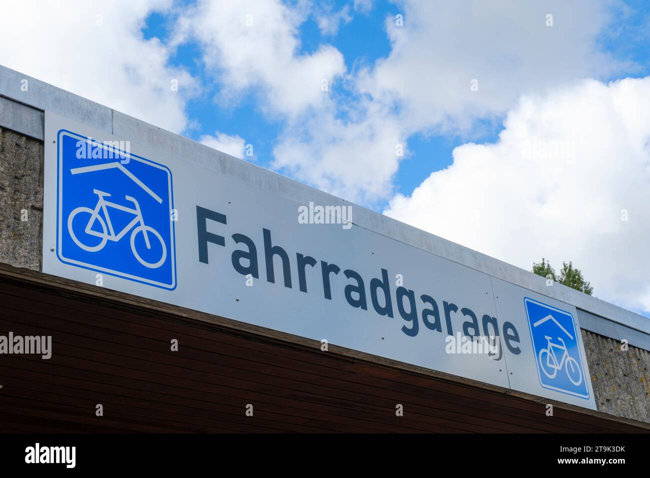Insegna e logo di un garage per biciclette Foto Stock
