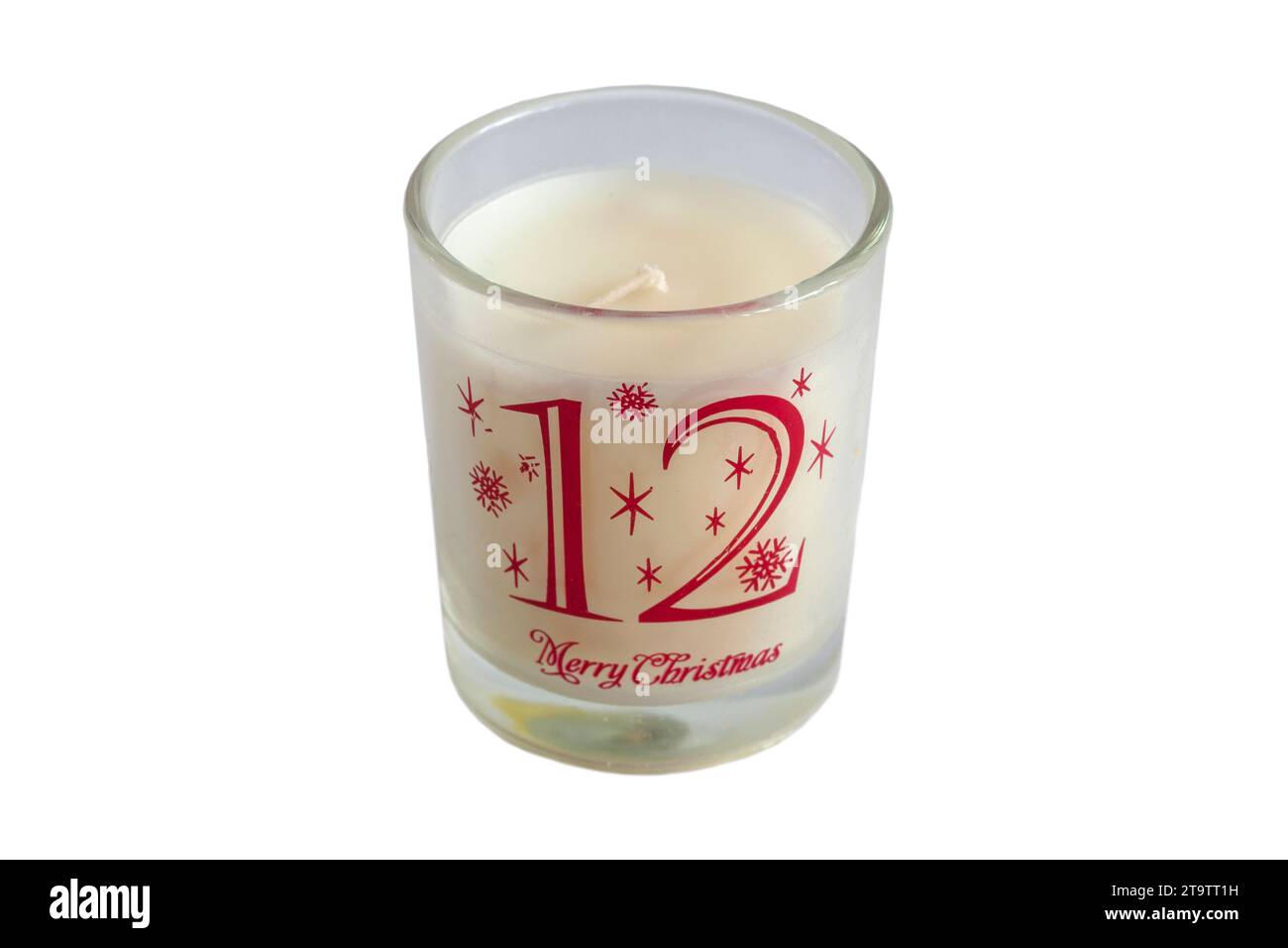 Candela votiva numero 12 dodici da 12 giorni di Natale candele votive incastonate isolate su sfondo bianco - buon Natale Foto Stock