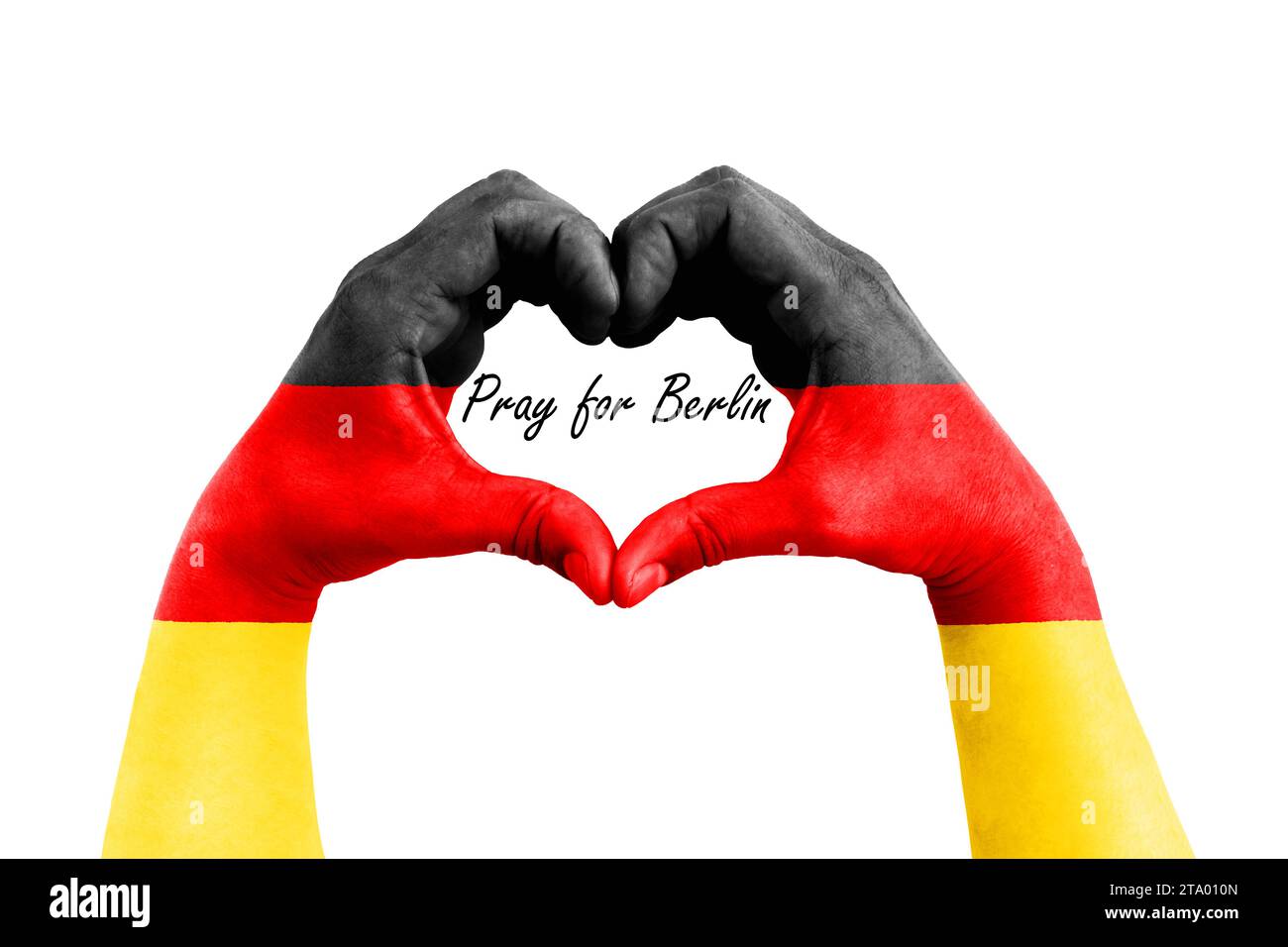 pregate per berlino, germania, l'uomo mani sotto forma di cuore con la bandiera della germania sullo sfondo bianco, concetto di speranza e aiuto utile per le vittime di berlino Foto Stock