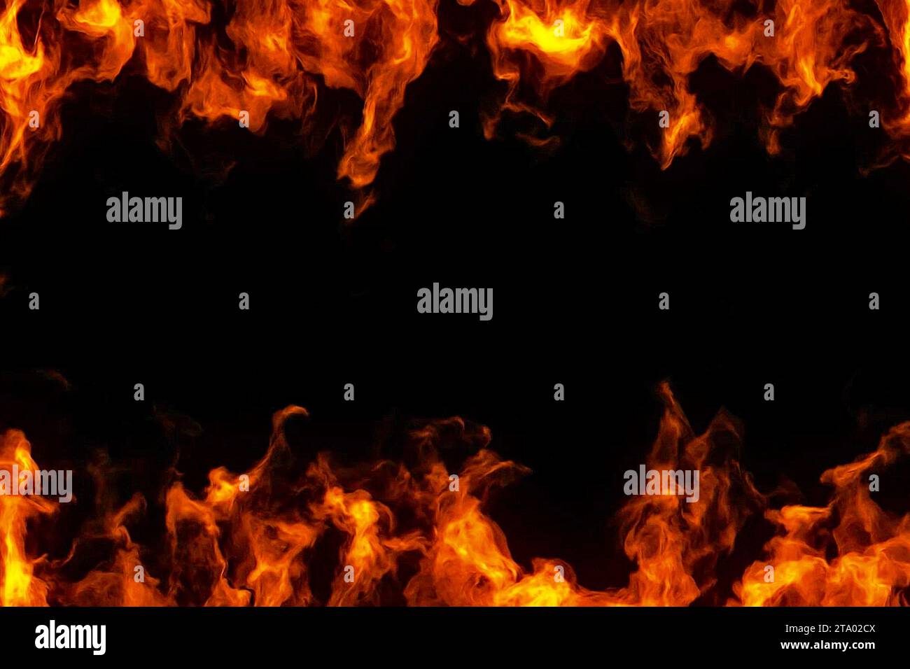 cornice di fiamme da fuoco reali che bruciano il movimento su sfondo nero Foto Stock
