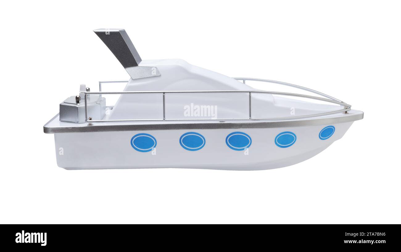 Nuova barca giocattolo di plastica isolata su bianco. Foto Stock