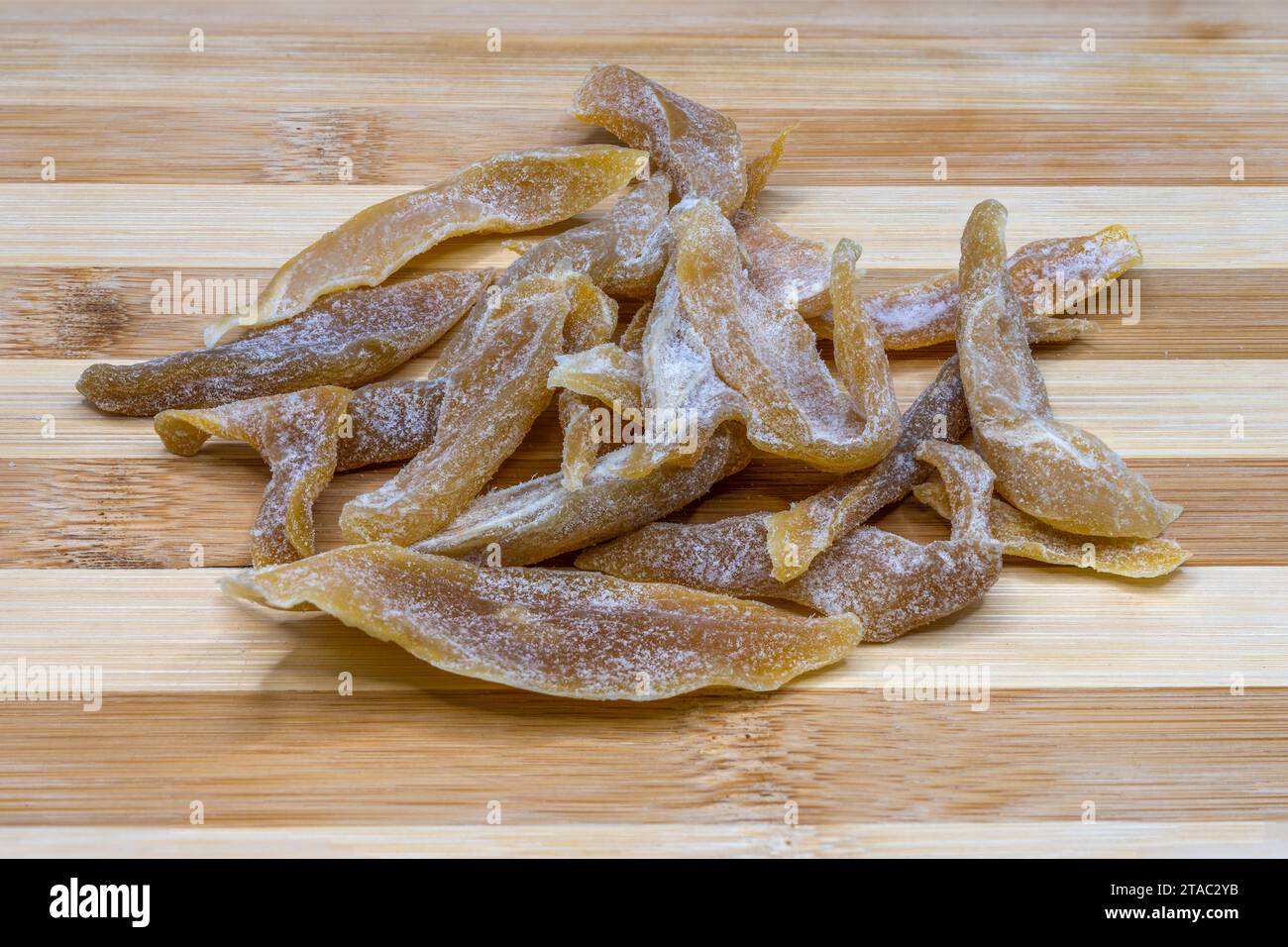 Fette essiccate al mango verde Foto Stock