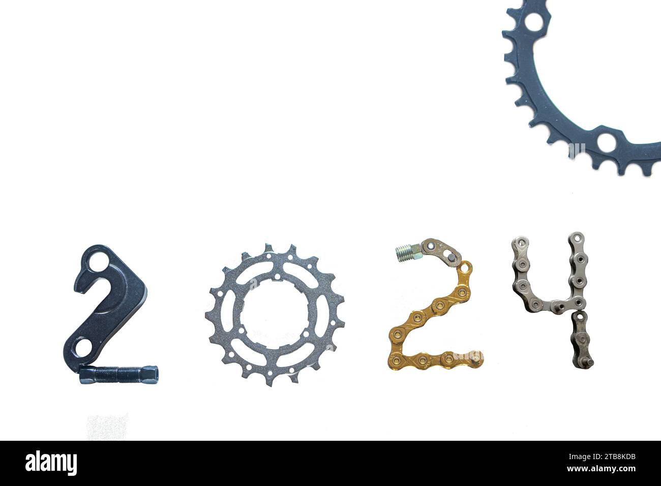 Concetto di parti di biciclette per felice anno nuovo 2024 Foto Stock