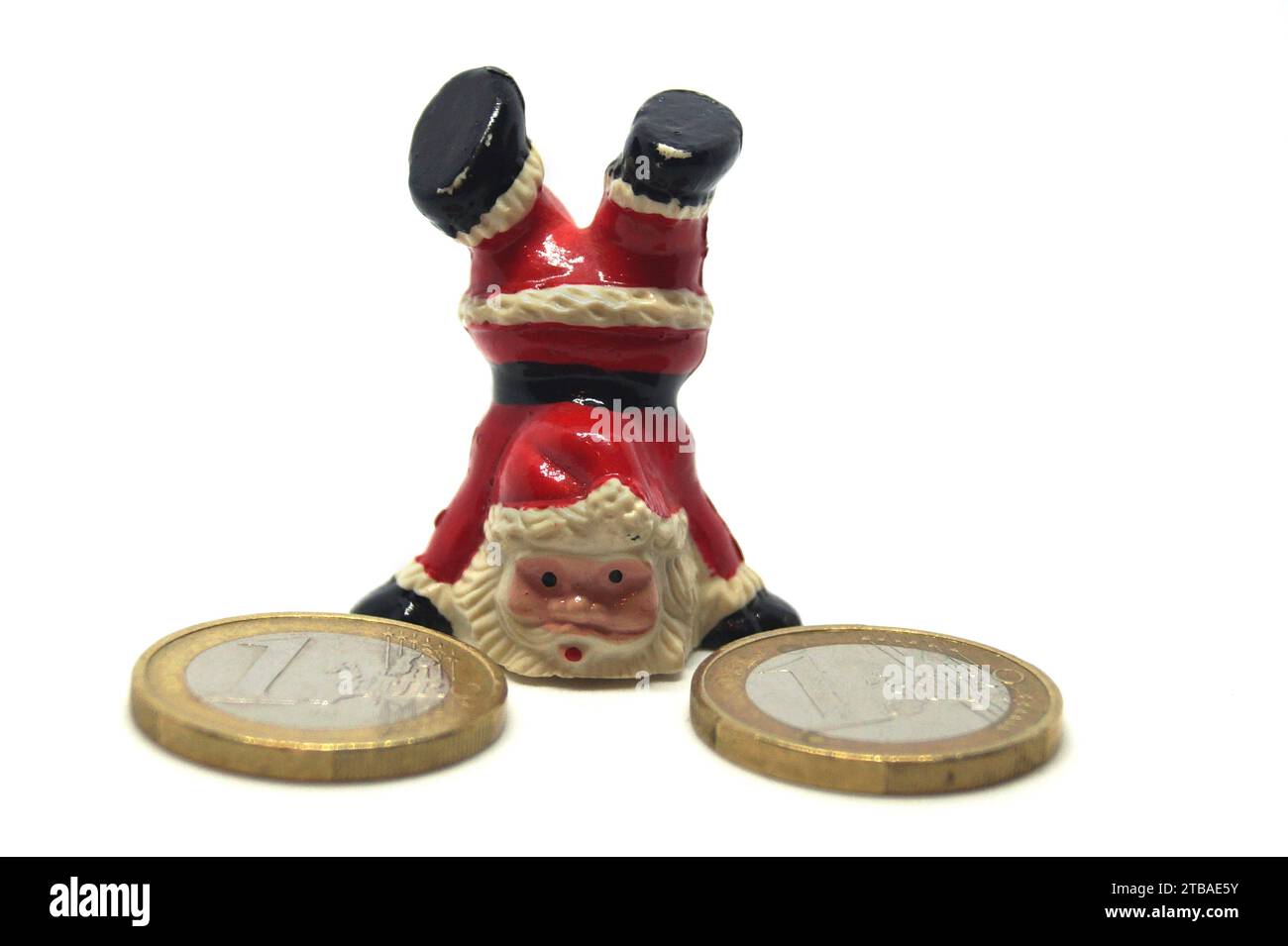 Babbo Natale con monete in euro, immagine del simbolo del bonus di fine anno Foto Stock