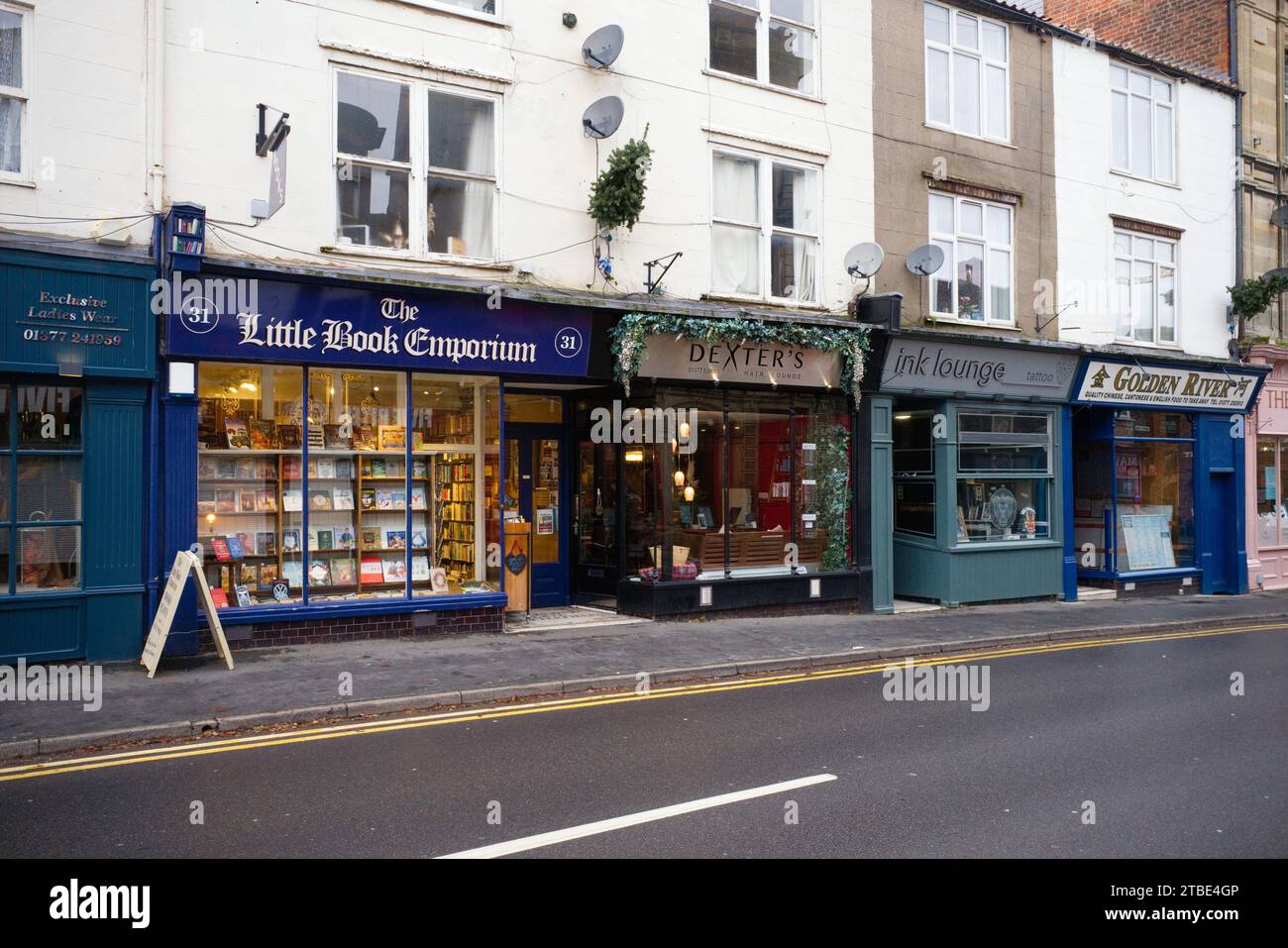 Piccoli negozi di vendita al dettaglio a Driffield, Yorkshire Foto Stock