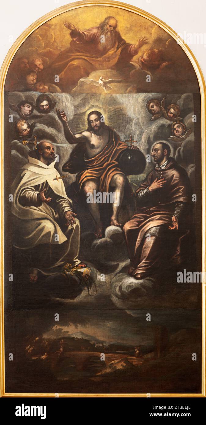 VICENZA, ITALIA - 7 NOVEMBRE 2023: Il dipinto della Santissima Trinità con San Carlo Borromeo e il beato Giovanni Colombini nella chiesa di San Marco Foto Stock