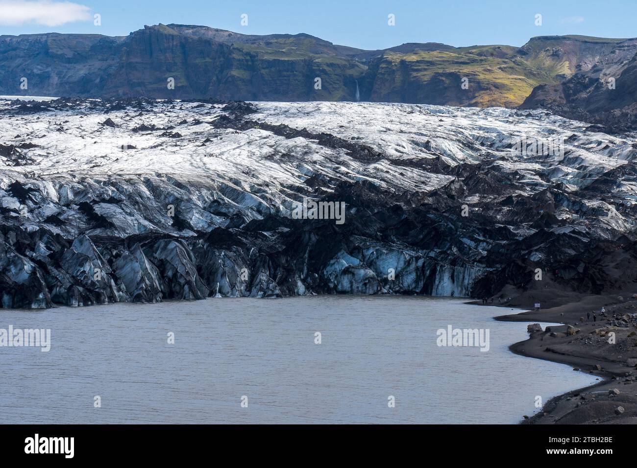 Lingua del ghiacciaio Solheimajokull del ghiacciaio Myrdalsjokull. Il Mýrdalsjökull è un ghiacciaio situato nel sud degli altopiani islandesi. Foto Stock