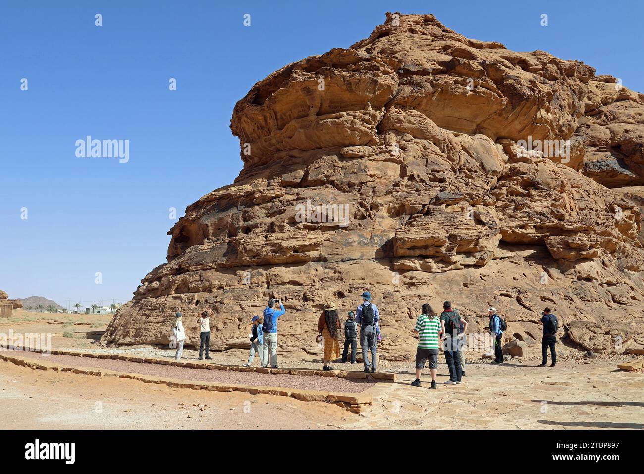 Turisti al monte Umm Sinman in Arabia Saudita Foto Stock