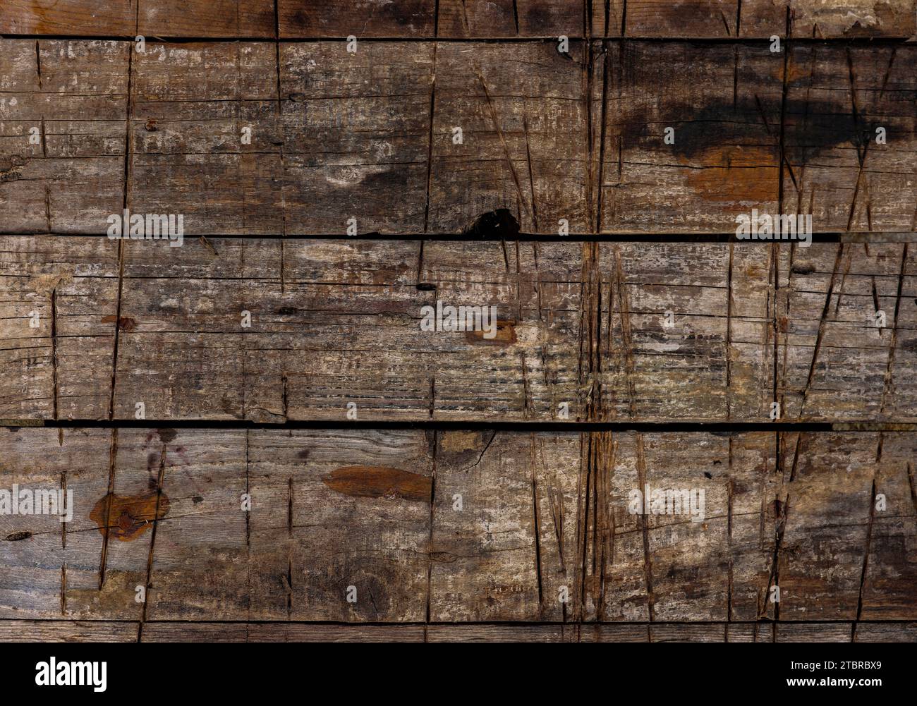 Vecchio sfondo rustico in legno con tracce di taglio Foto Stock