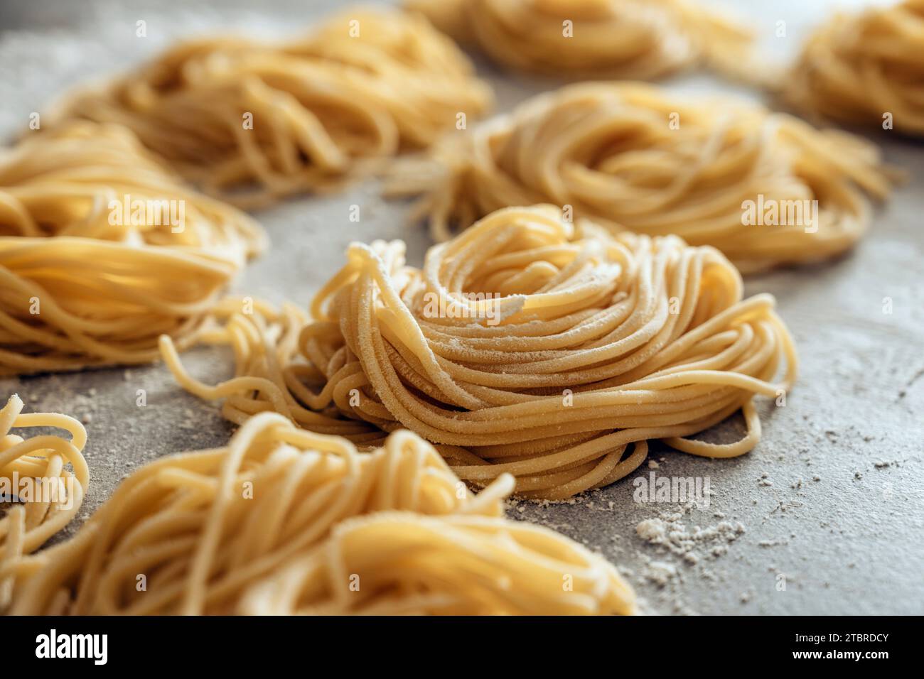 Nidi di pasta, spaghetti fatti in casa Foto Stock