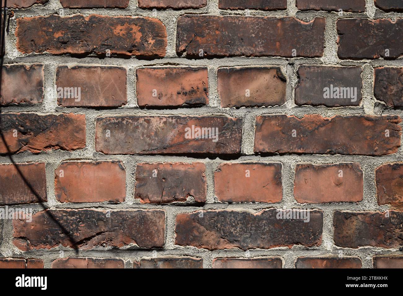 Weathered rosso mattone texture a parete Foto Stock