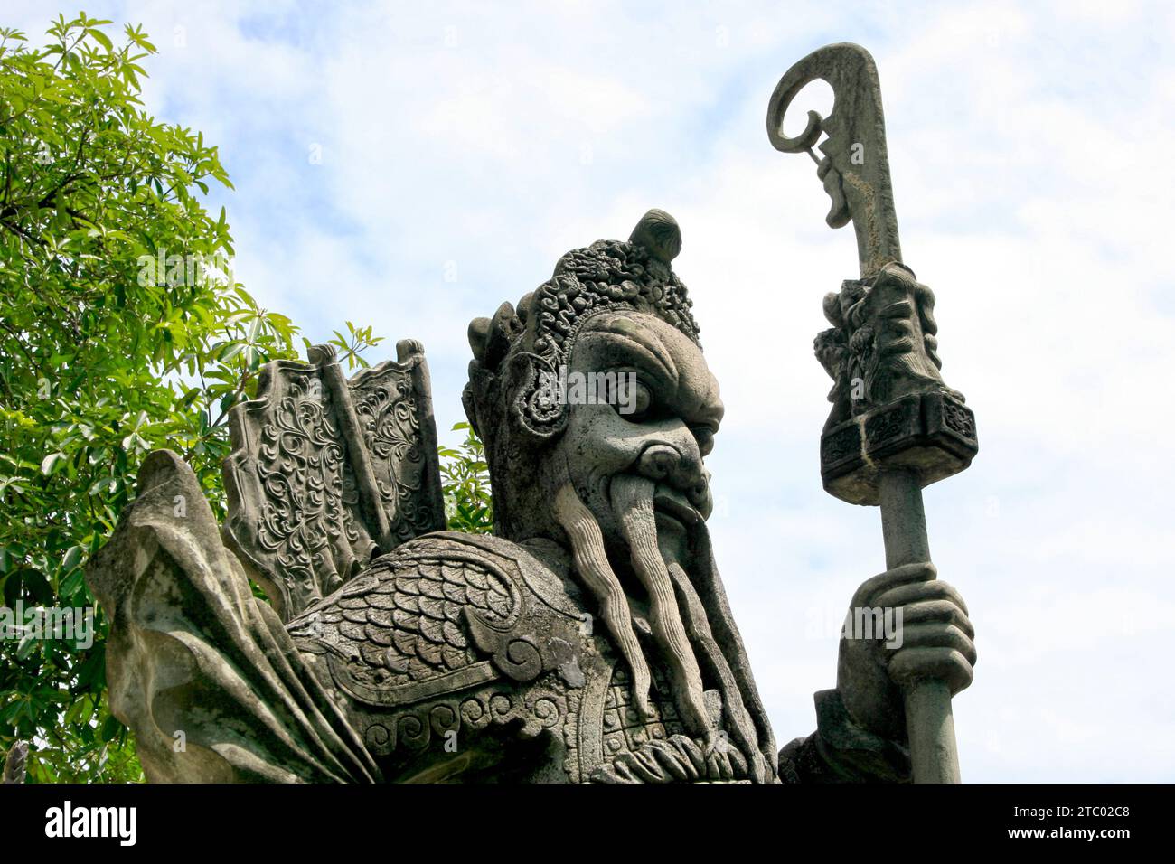 Primo piano su una statua a Wat Pho a Bangkok, Thailandia. Foto Stock
