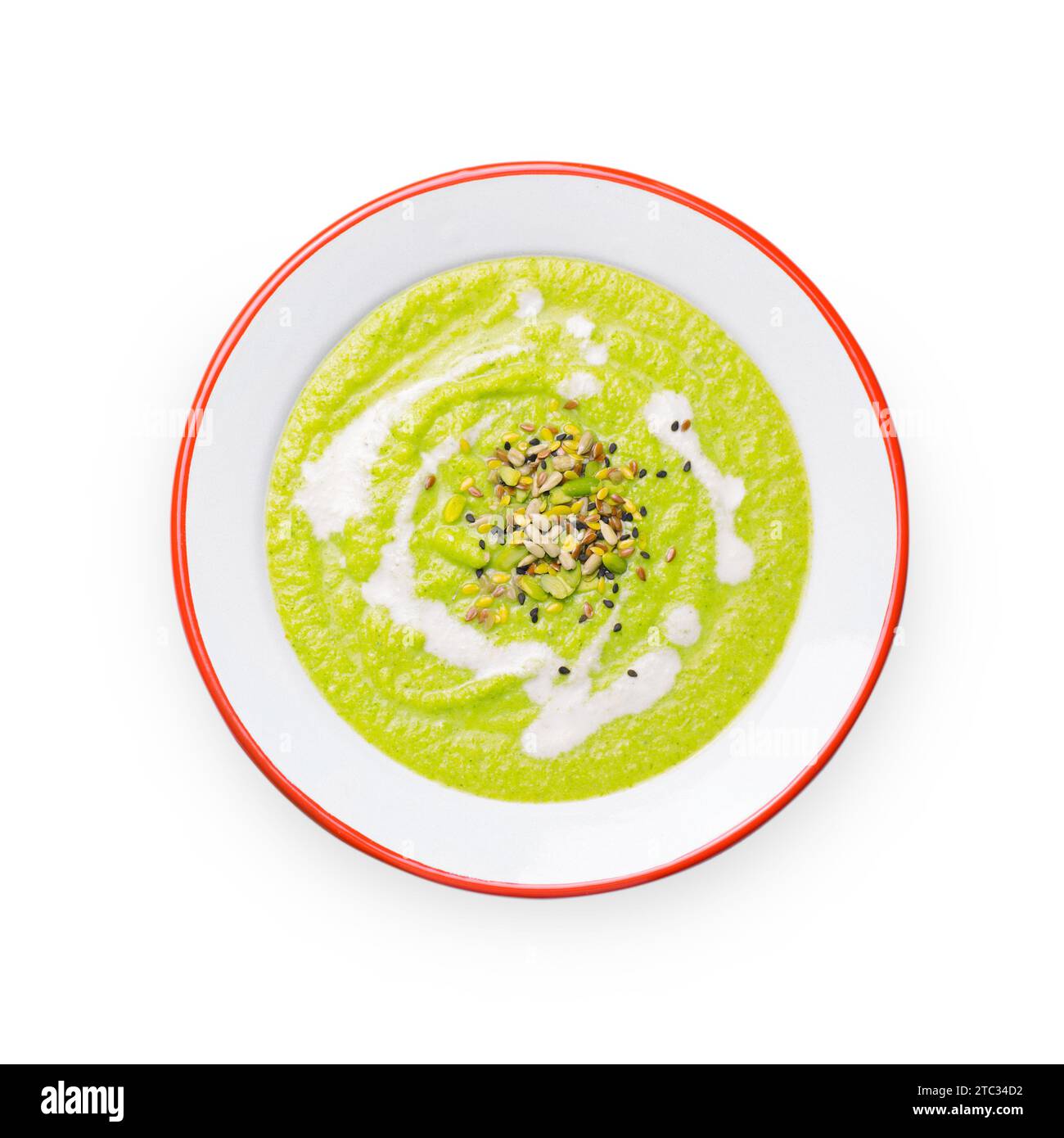 Zuppa di crema di broccoli vegano verde con latte di anacardi e miscela di semi, Detox alimentazione sana su sfondo bianco isolato Foto Stock