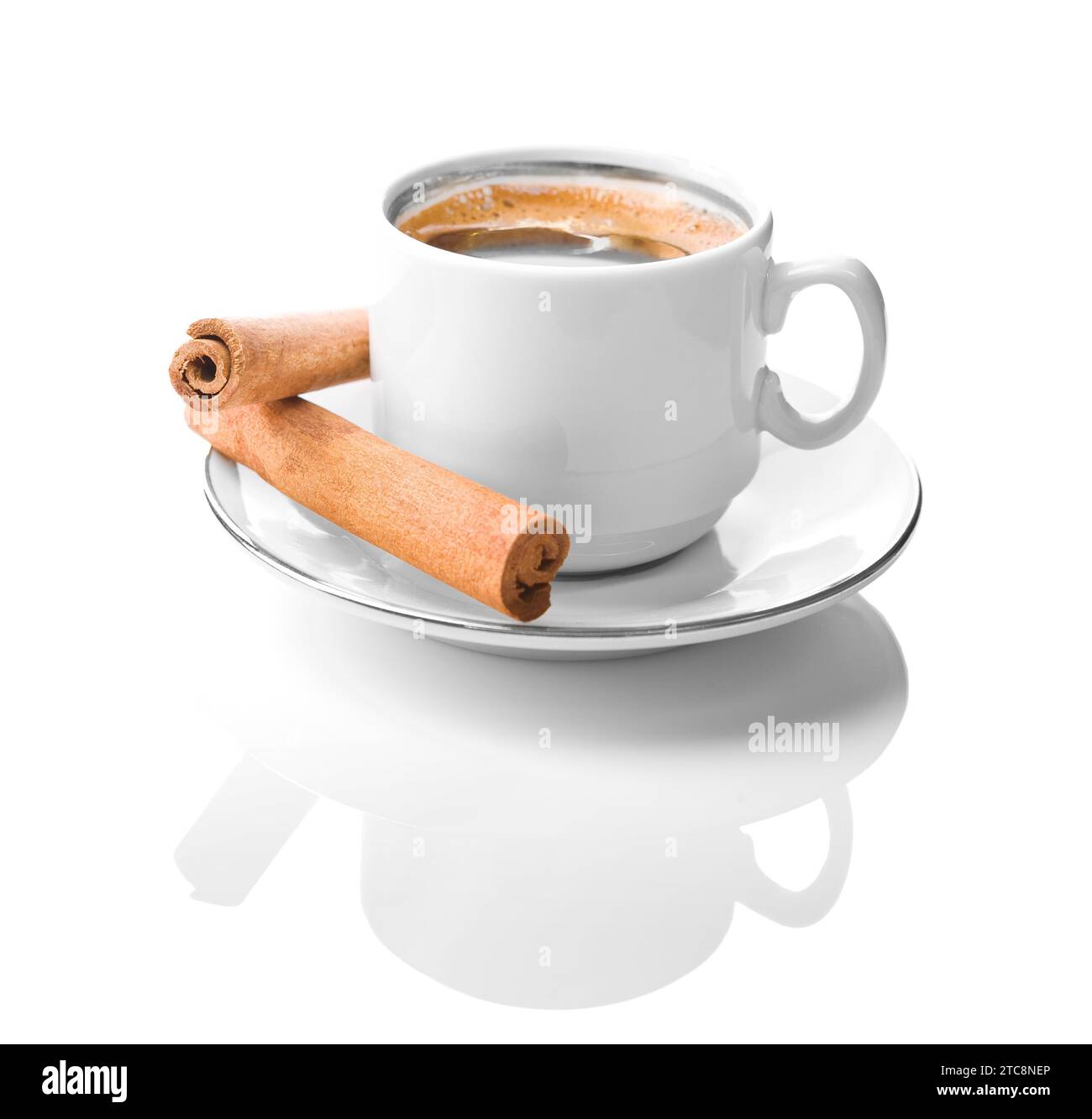 Tazza di caffè bianca con cannella Foto Stock