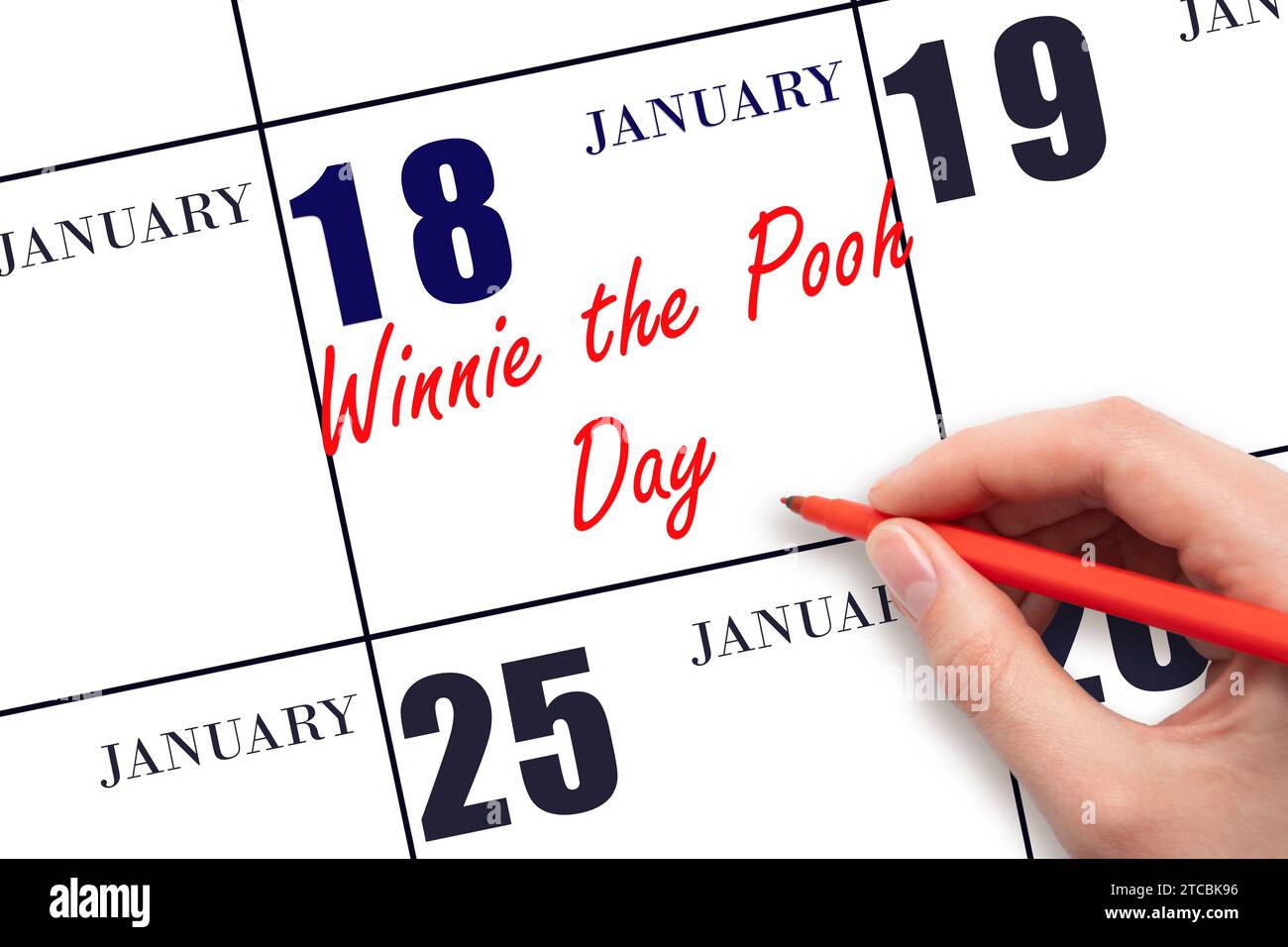 18 gennaio. Scrivere a mano un testo per il giorno del Winnie the Pooh nella data del calendario. Segnatevi la data. Vacanze. Concetto di giorno dell'anno. Foto Stock