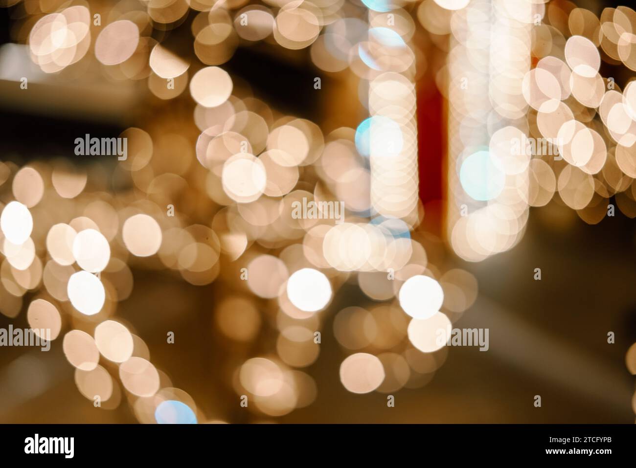 Bokeh dorato come sfondo. Foto Stock