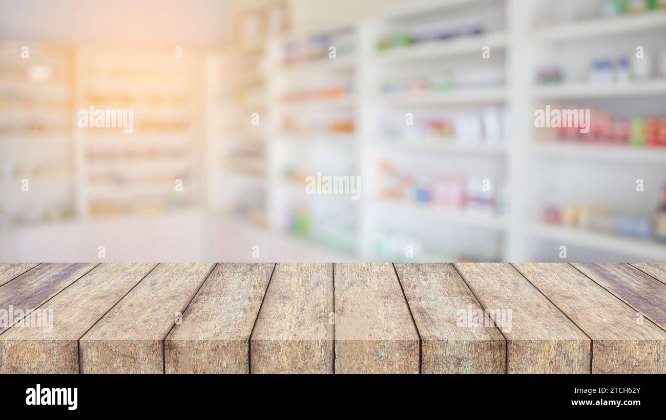 piano in legno sopra l'interno della farmacia con sfondo sfocato Foto Stock