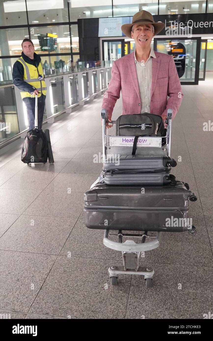 Nigel Farage arriva all'aeroporto di Heathrow, Londra, dopo aver preso parte alla serie ITV i'm A Celebrity Get me Out of Here! In Australia. Data foto: Mercoledì 13 dicembre 2023. Foto Stock