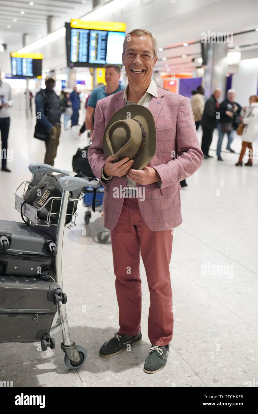 Nigel Farage arriva all'aeroporto di Heathrow, Londra, dopo aver preso parte alla serie ITV i'm A Celebrity Get me Out of Here! In Australia. Data foto: Mercoledì 13 dicembre 2023. Foto Stock