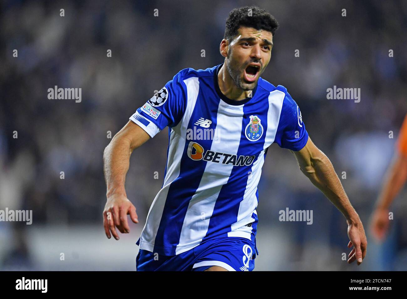 Porto, Portogallo. 13 dicembre 2023: EUFA Champions League calcio, FC Porto contro Shakhtar Donetsk: Mehdi Taremi del Porto FC, festeggia il gol al 62° minuto credito: Action Plus Sports Images/Alamy Live News Foto Stock