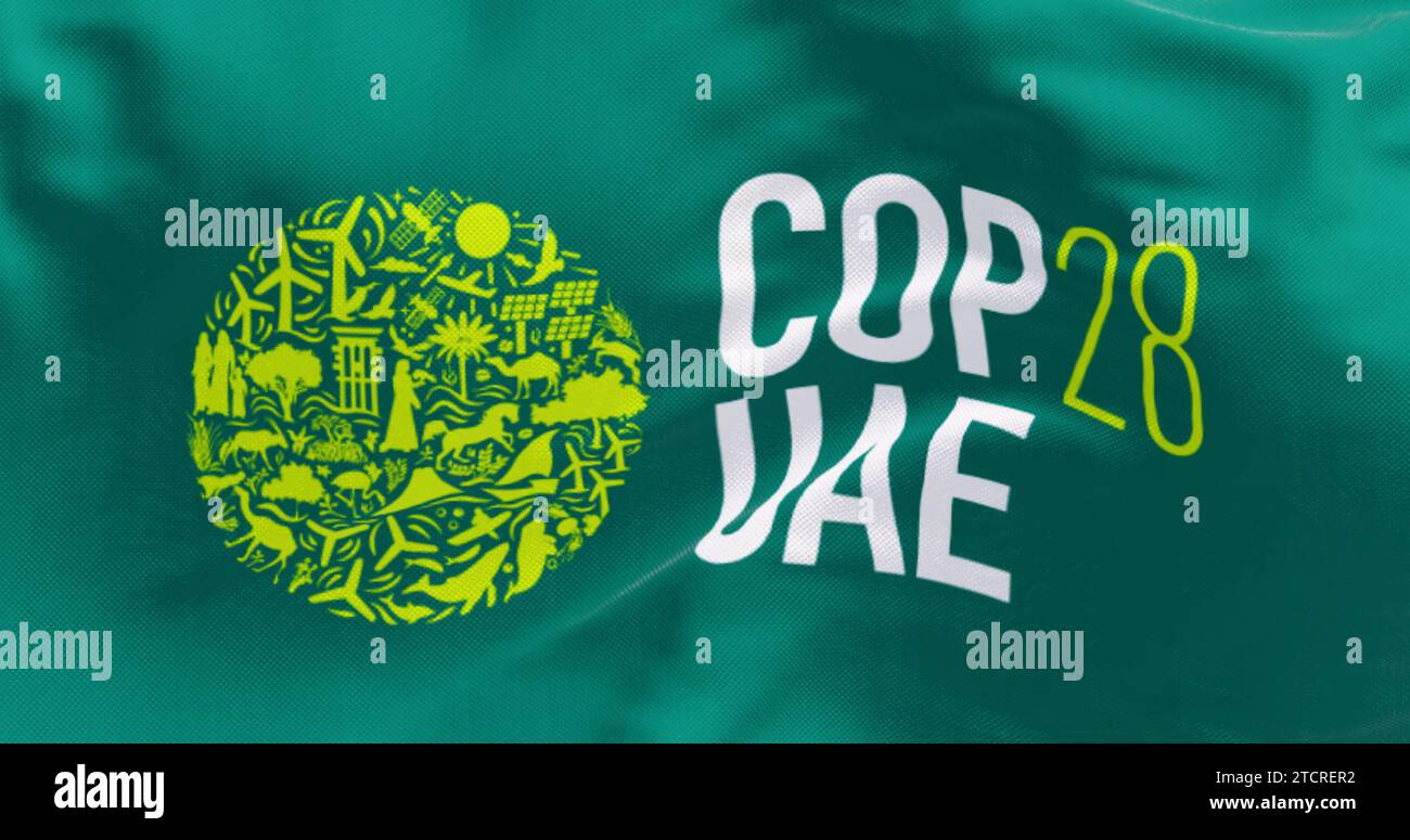 Dubai, Emirati Arabi Uniti, novembre 30 2023: Primo piano della bandiera COP28. rendering dell'illustrazione 3d. Sfondo in tessuto testurizzato Foto Stock