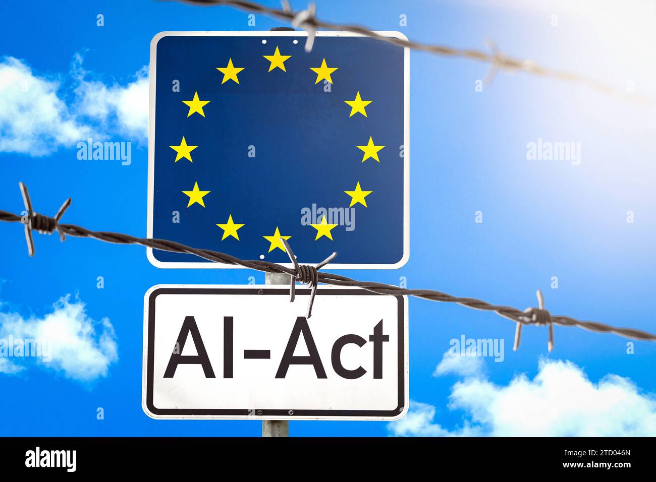 15 dicembre 2023: Firma con bandiera dell'UE dietro una recinzione di filo spinato con l'iscrizione ai-Act FOTOMONTAGE *** Schild mit EU-Flagge hinter einem Stacheldrahtzahn mit der Aufschrift ai-Act FOTOMONTAGE Foto Stock