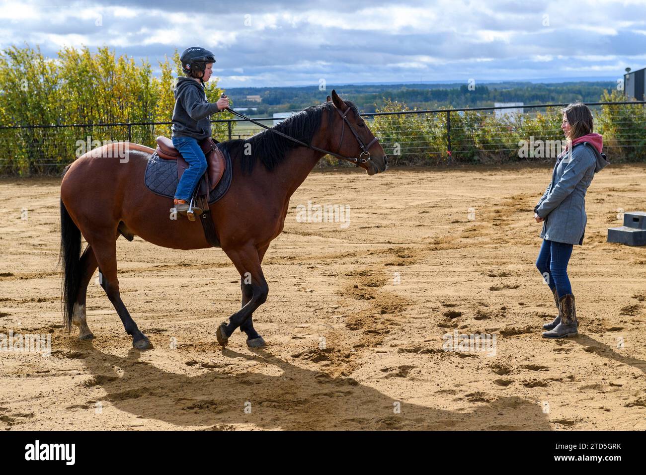 Lezioni di equitazione per bambini Foto Stock