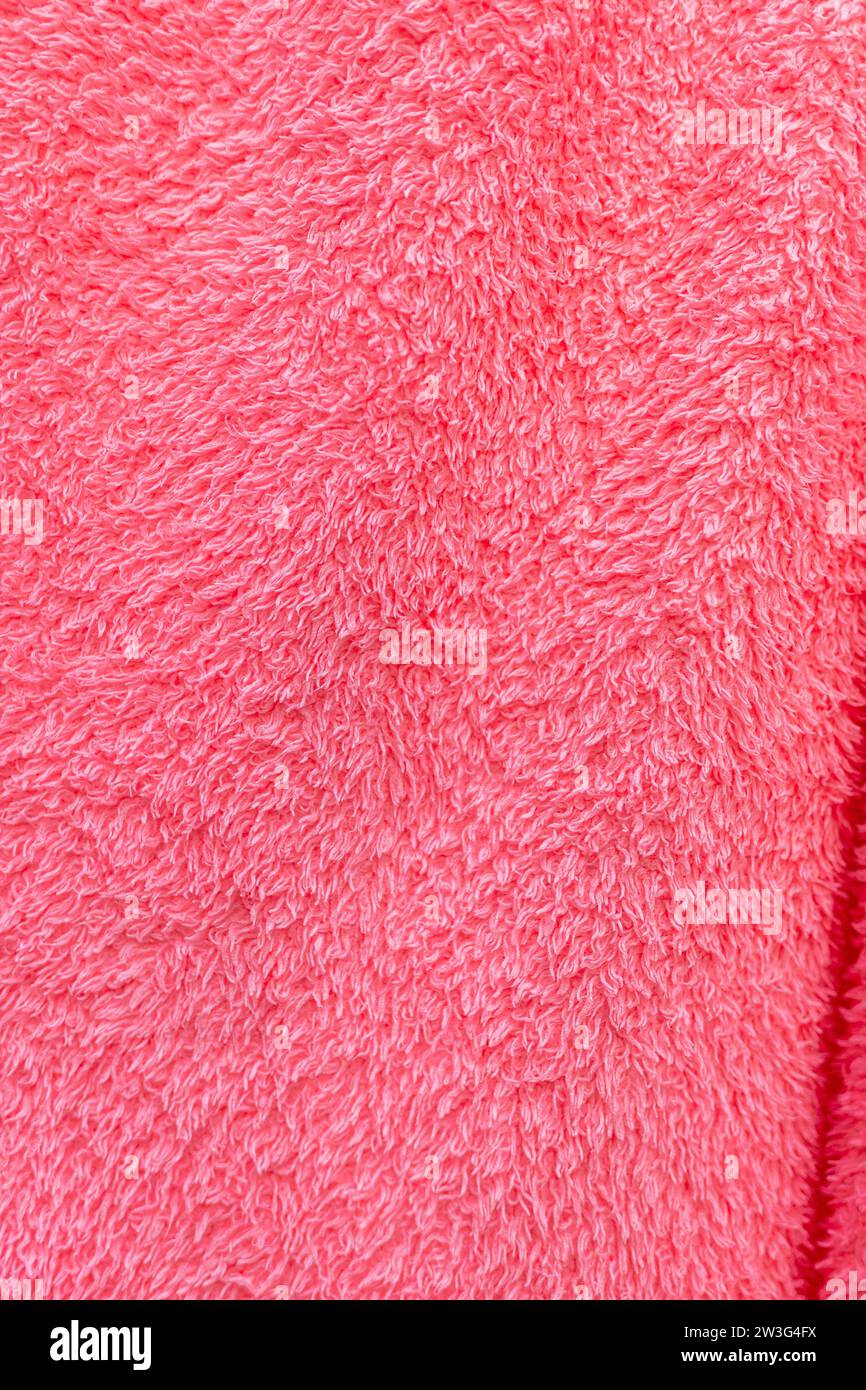 dettaglio di un asciugamano rosso, trama e sfondi. Foto Stock