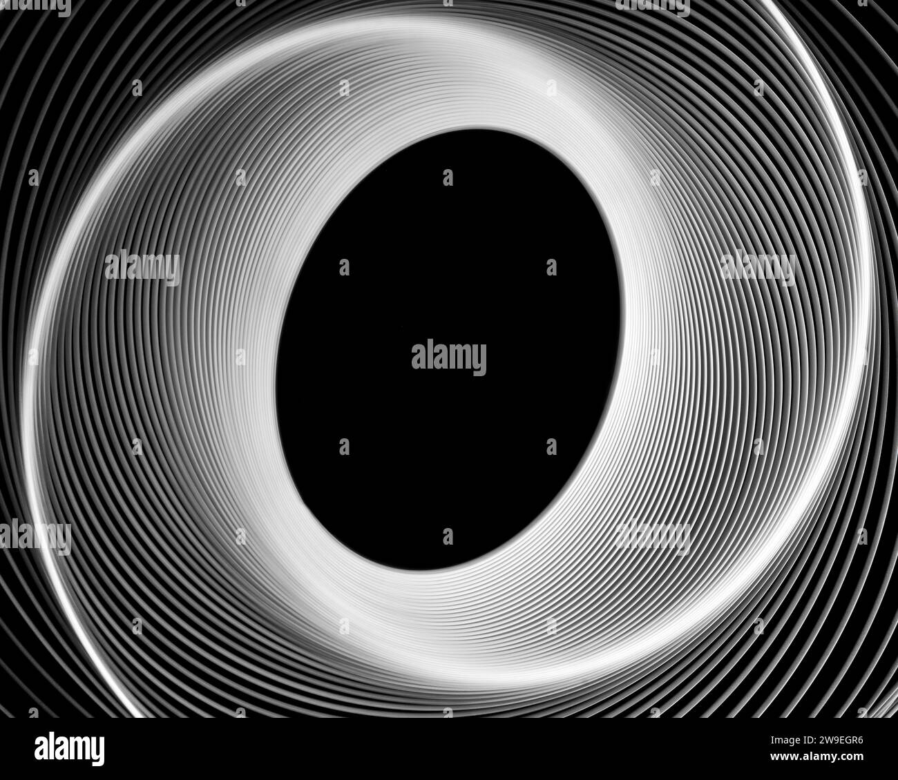 FOTO : foto di pittura leggera di spirografi bianchi su sfondo nero Foto Stock