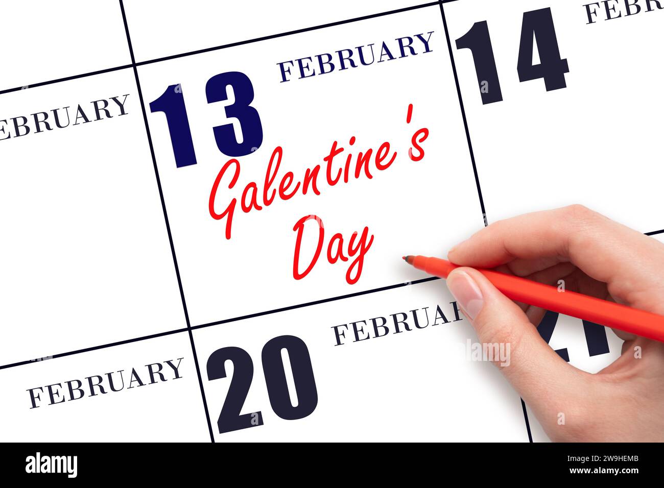 13 febbraio. Scrivere a mano il giorno di Galentino nella data del calendario. Segnatevi la data. Vacanze. Concetto di giorno dell'anno. Foto Stock