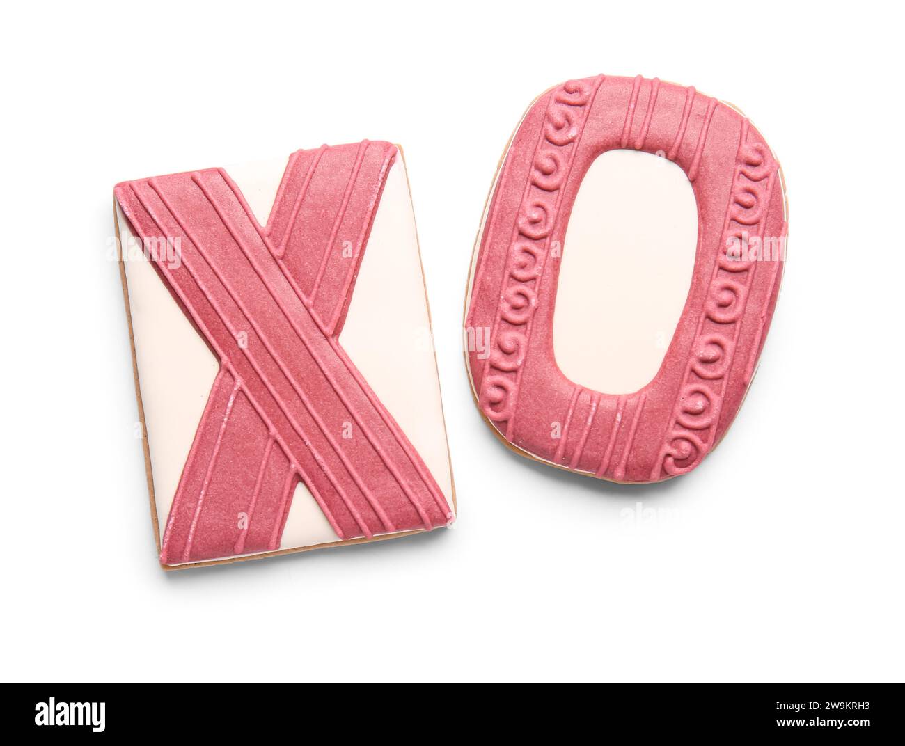 Dolci biscotti a forma di simbolo XO su sfondo bianco. Festa di San Valentino Foto Stock