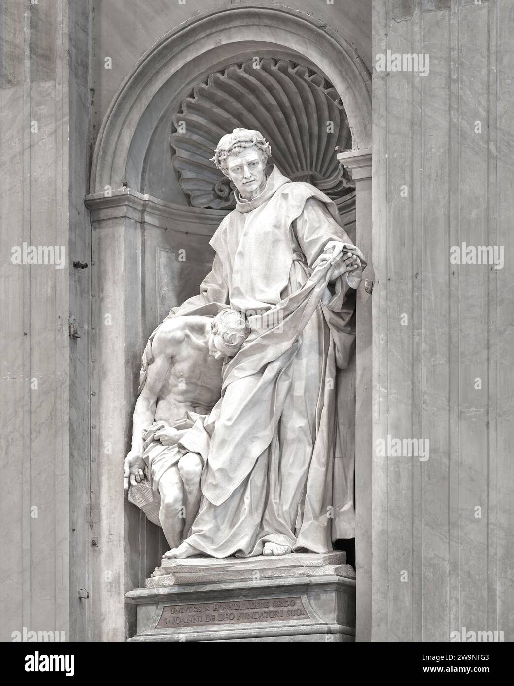 Statua commemorativa, a San Giovanni di Dio, nella basilica di San Pietro, Vaticano, Roma, Italia Foto Stock