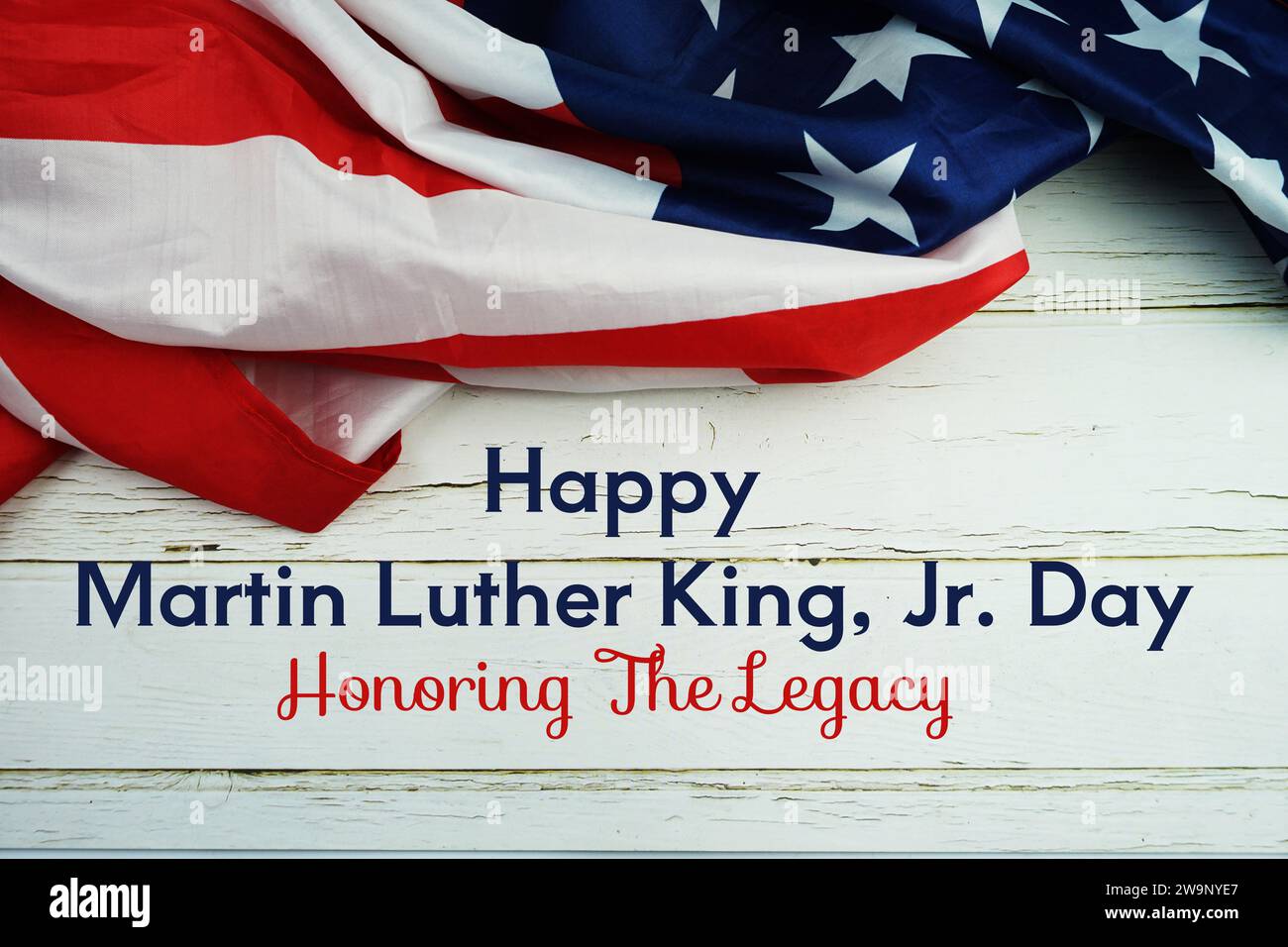 Happy Martin Luther King Jr Day messege di testo con bandiera USA su sfondo di legno Foto Stock