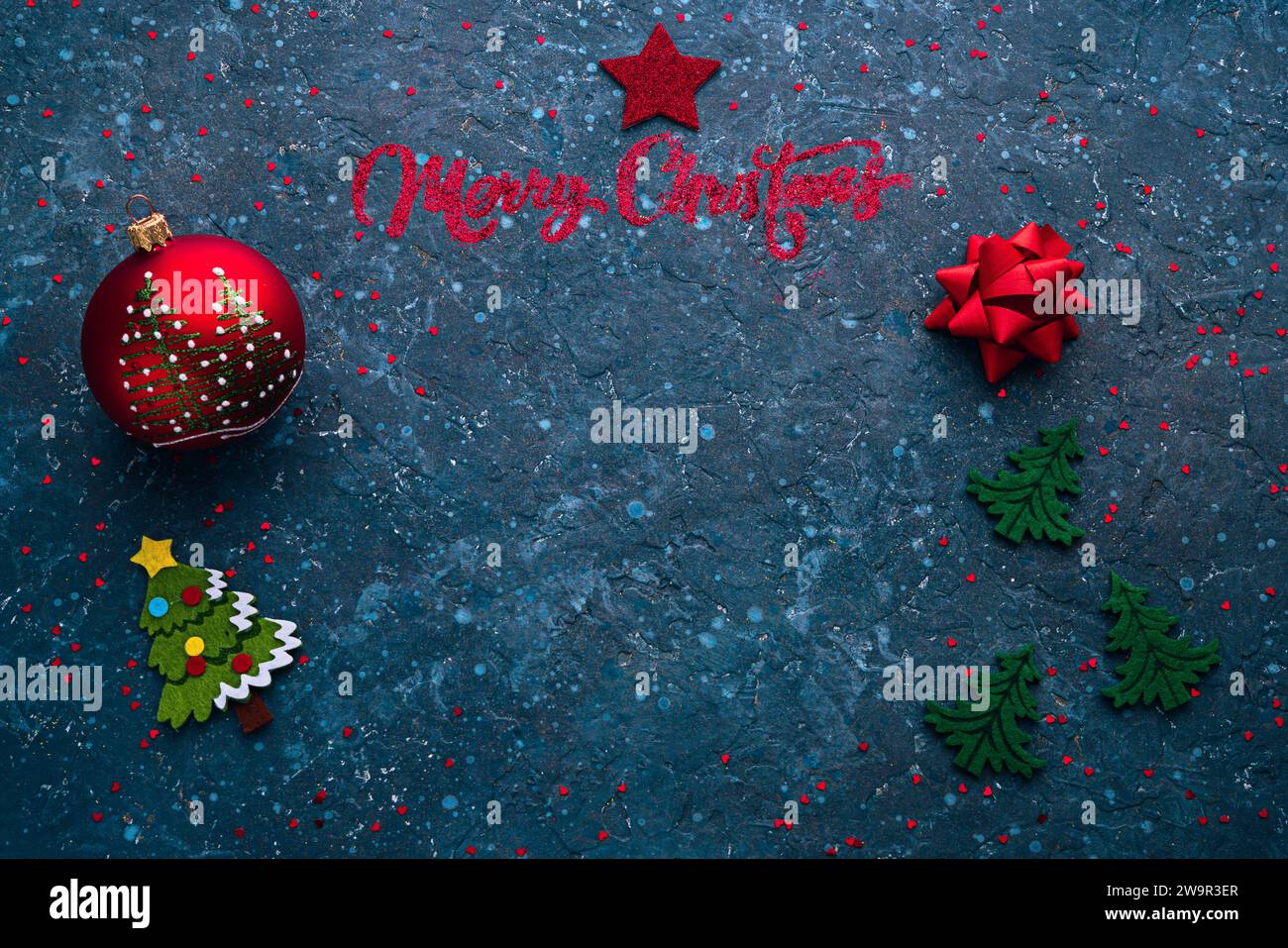 Buon Natale e felice anno nuovo sfondo blu testurizzato con spazio per la copia del testo Foto Stock