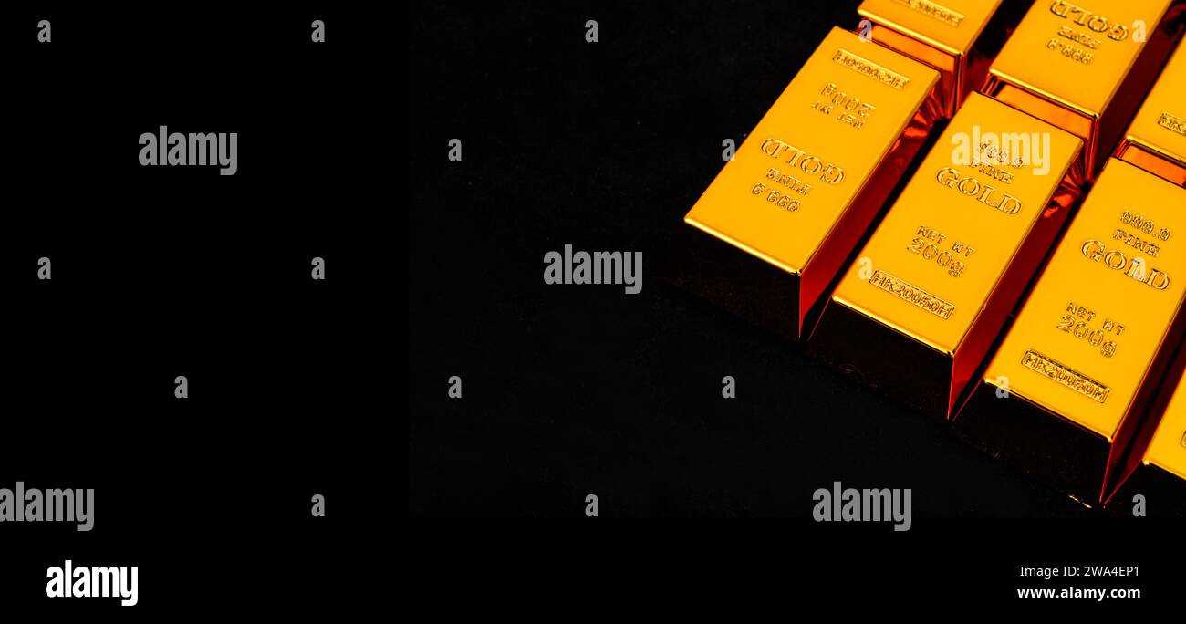 Foto ravvicinata sfondo nero con barra dorata Foto Stock