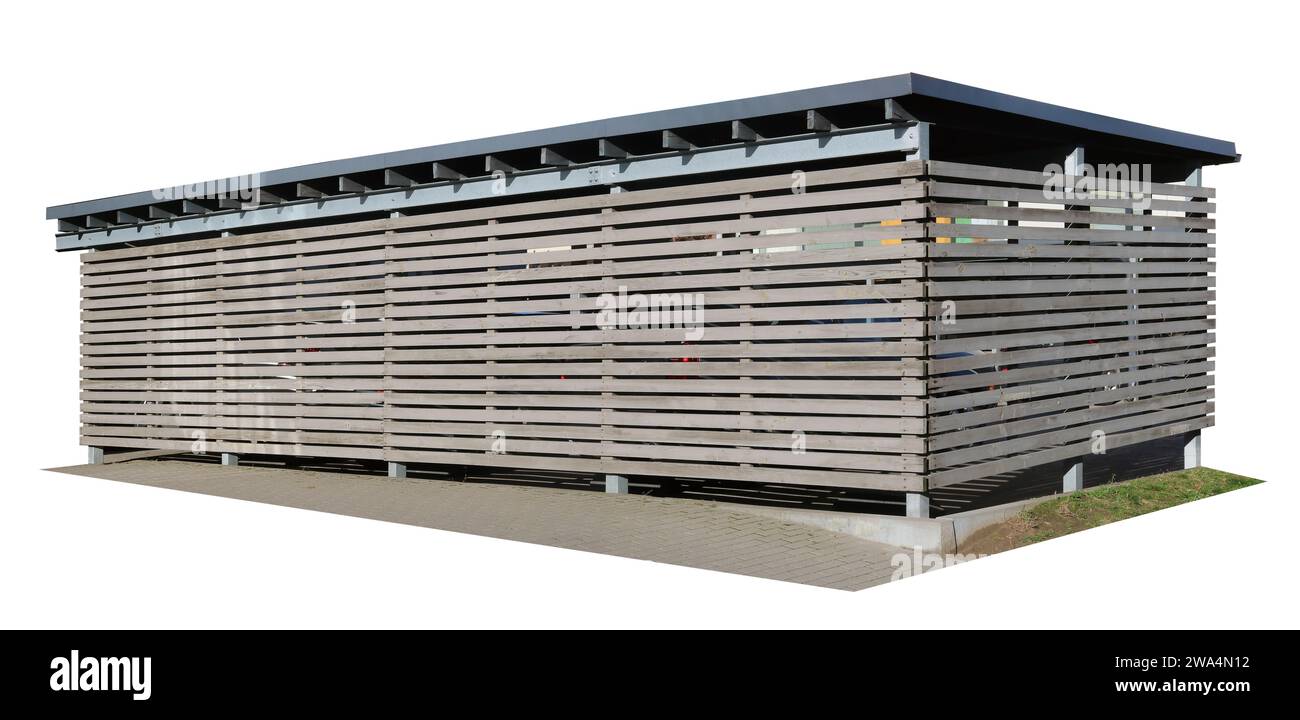 Parcheggio coperto in città per auto in tavole di legno. isolato su bianco Foto Stock