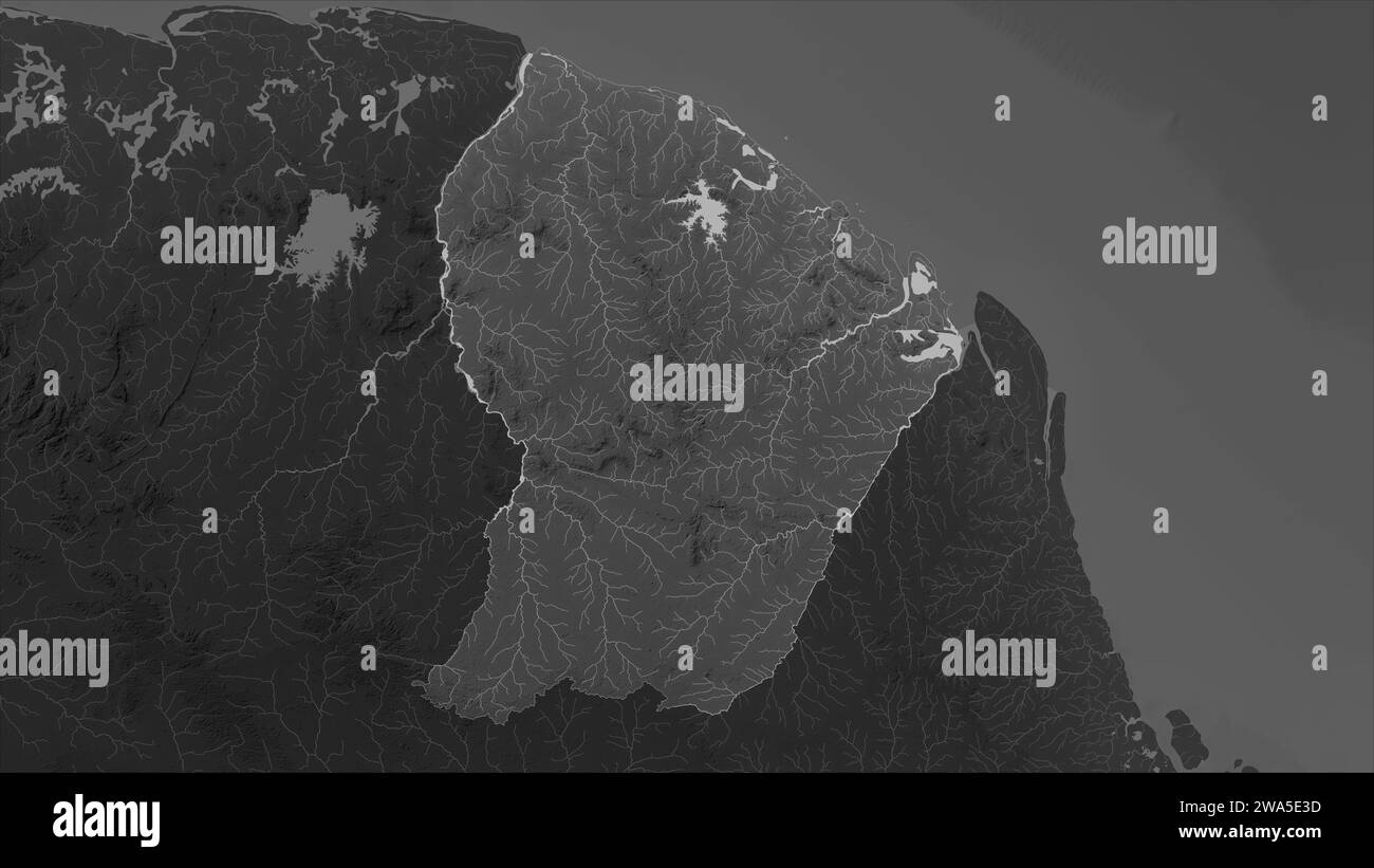 La Guiana francese è evidenziata su una mappa di elevazione in scala di grigi con laghi e fiumi Foto Stock