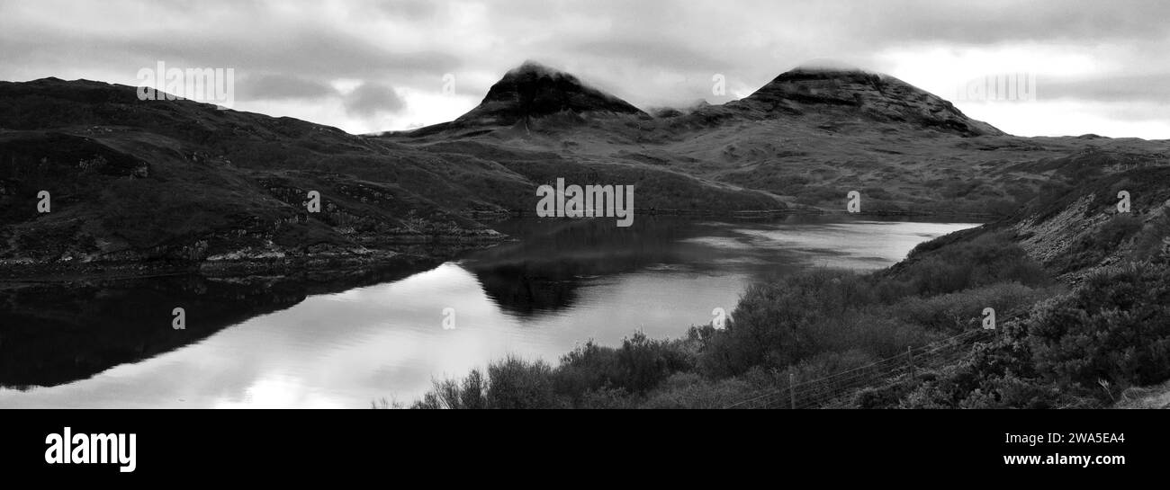 Vista sul lago A' Chàirn Bhàin dal ponte Kylesku, Sutherland, Scozia nord-occidentale, Regno Unito Foto Stock