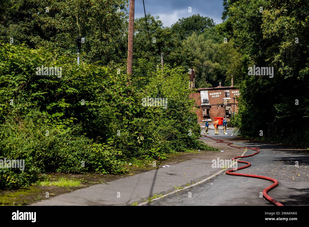 IL CROOKED HOUSE PUB, LA MATTINA DOPO L'INCENDIO Foto Stock